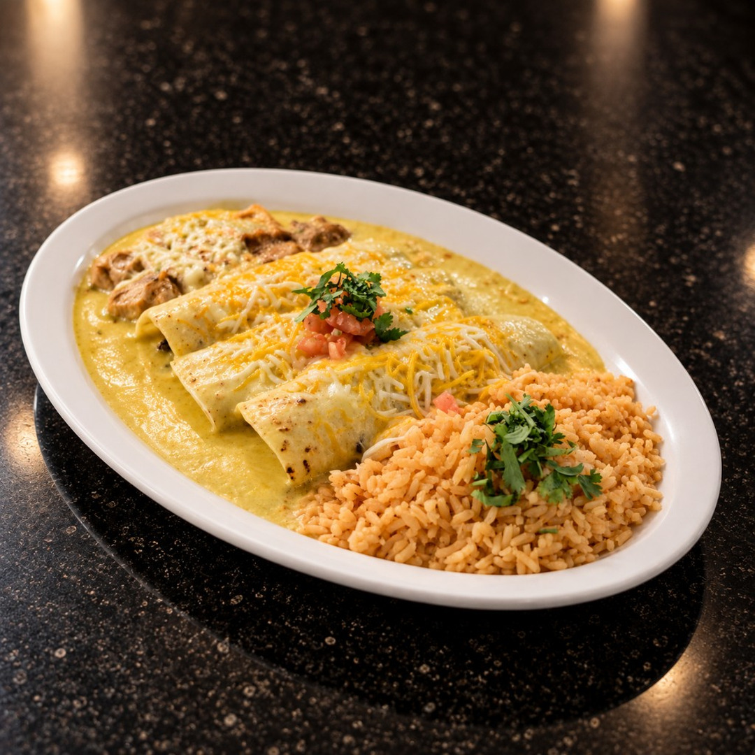 Enchiladas verdes with Mexican rice at Salsa Roja Dallas